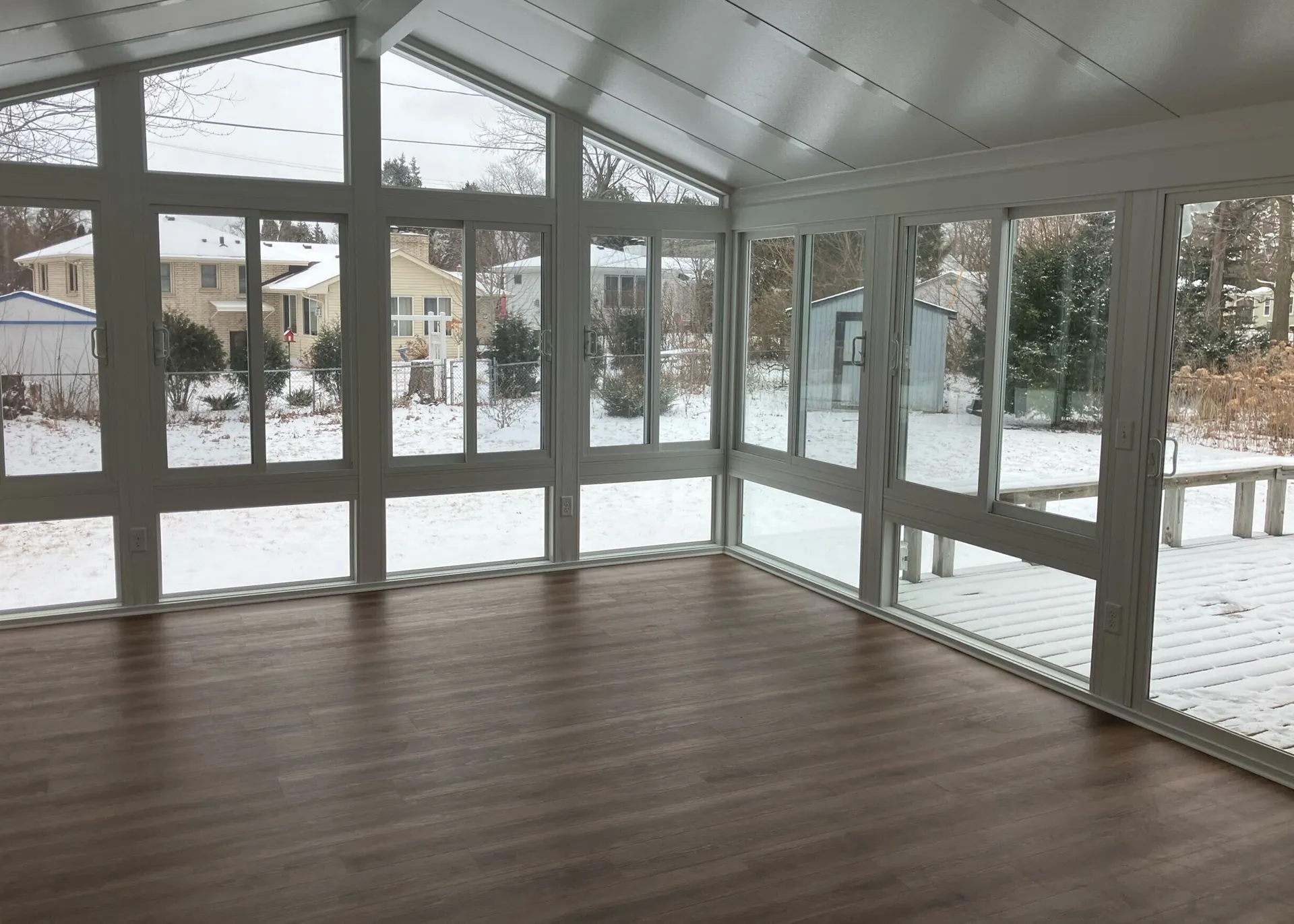 Minnesota all-season sunroom with winter view